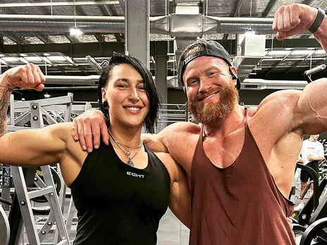 Rhea Ripley with Buddy Matthews