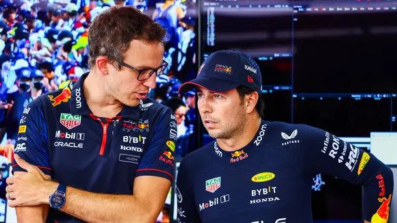 Sergio Perez with his race engineer 