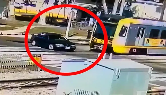 BMW Collides With Metro Train: Watch The Video At Your Own Risk