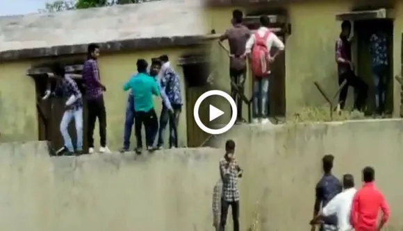 Viral: Group Of Men Climb School Wall With Chits To Help Students Cheat