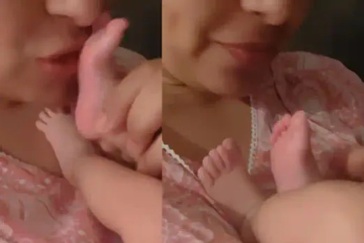 Bipasha Basu kisses daughter Devi's feet, calls her 'first best gift'. See Photos !!
