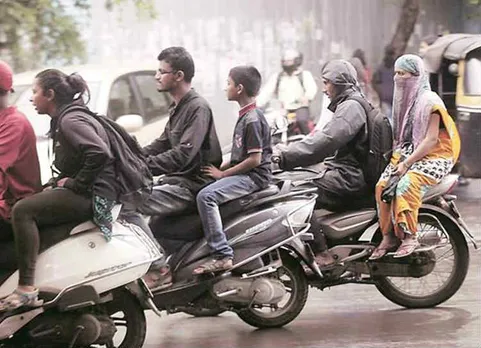 இருசக்கர வாகனங்களில் பின் இருக்கையில் அமர்பவரும் ஹெல்மெட் அணிவது கட்டாயம்