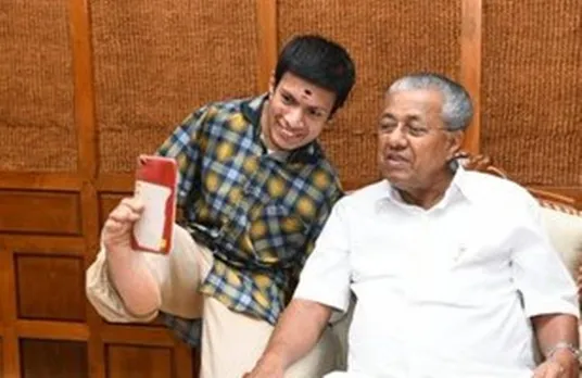 pinarayi vijayan with disabled man pranav