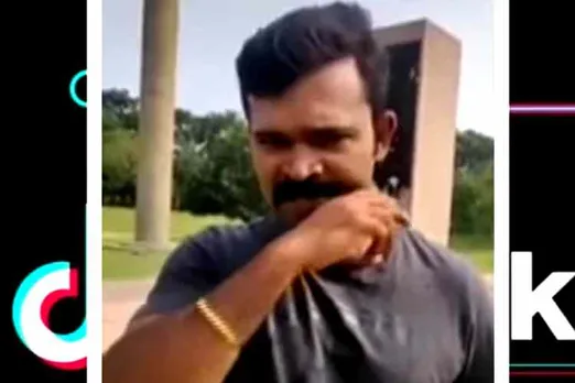 Naam Tamilar Katchi functionary tiktok video at rajiv gandhi memorial, நாம் தமிழர் கட்சி நிர்வாகி டிக்டாக் வீடியோ, ராஜிவ் காந்தி நினைவிடம், வைரல் வீடியோ, Naam thamizhar Katchi youth tiktok video, Naam Tamilar Katchi tiktok at rajiv gandhi memorial, congress party complaint on Naam thamizhar Katchi youth, rajiv gandhi memorial sriperumputhur, Naam Thamizhar Katchi