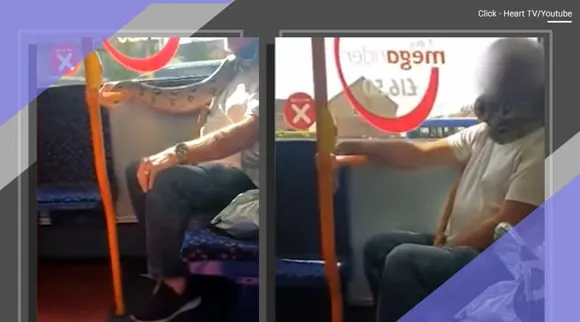 ஓடும் பேருந்தில் பாம்பை முகக்கவசமாக சுருட்டிய மனிதர்: வீடியோ வைரல்