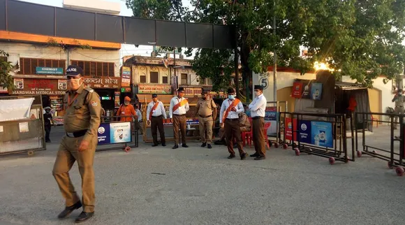 In Kumbh crowd management, a first: RSS workers as Special Police Officers