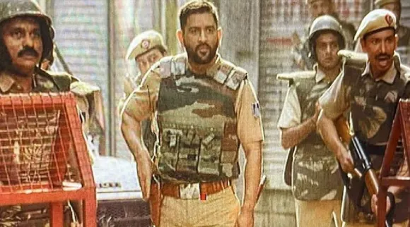 MS Dhoni as cop AD shoot, fans demand to act cinema Tamil News