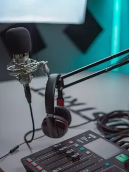 Business Opportunities in Podcasting Profitable Podcasting Podcast Production Provide audio editing, mixing, and mastering to help podcasters improve their programmes. Podcasting Classes Storytelling, interviewing, and podcast marketing workshops for podcasters and businesses. Podcast Editing and Transcription Save podcasters time by editing and transcribing their content. Podcast Live Shows Plan and host live podcast events like panel discussions, live recordings, and podcaster and listener meet-ups. Podcast Gear Sell podcasters microphones, headphones, and software. Podcast Network Distribute a variety of podcasts to attract listeners and advertisers. Podcast Analytics To track performance and monetization, create a podcast hosting platform with analytics and audience insights. Sponsorship and Advertising Connect podcasters and brands that want to sponsor or advertise on popular podcasts. Podcast merch like t-shirts, mugs, and stickers with catchphrases and logos.