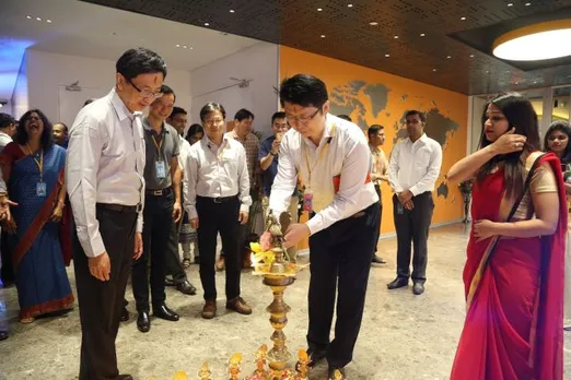 Jeffrey Ju Co Chief Operating Officer Executive VP MediaTek Inc. lighting the lamp of the new MediaTek office in Bangalore e