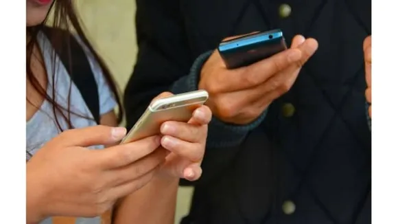 People using smartphones