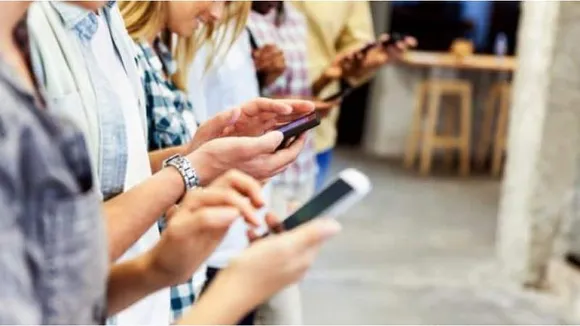 people using mobile phone