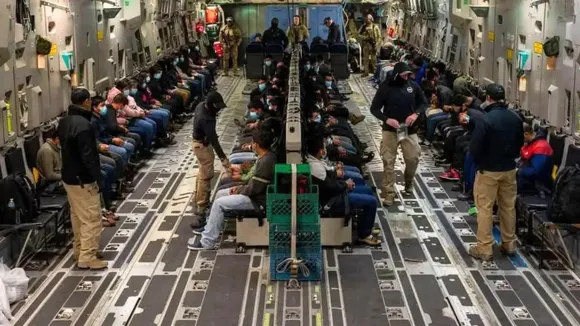 अप्रवासी