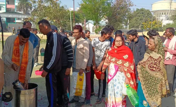 कि