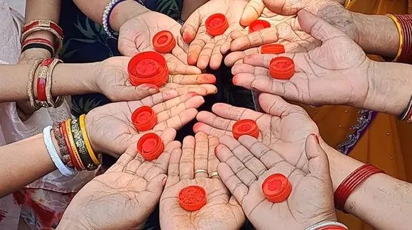 मी