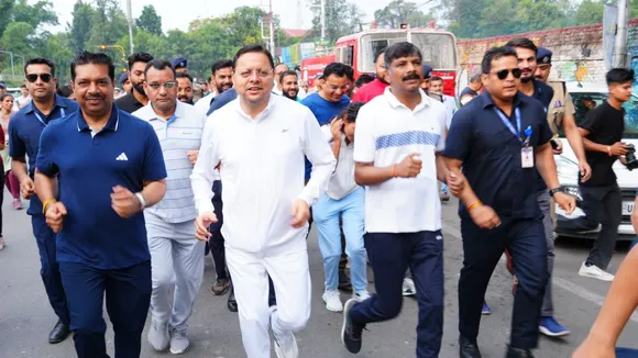 CM Pushkar Singh Dhami running in the marathon