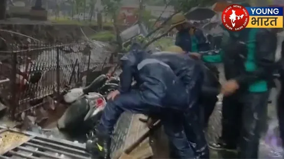 Heavy rain in Mumbai Ground caved in, wall collapsed and many bikes got buried under the debris