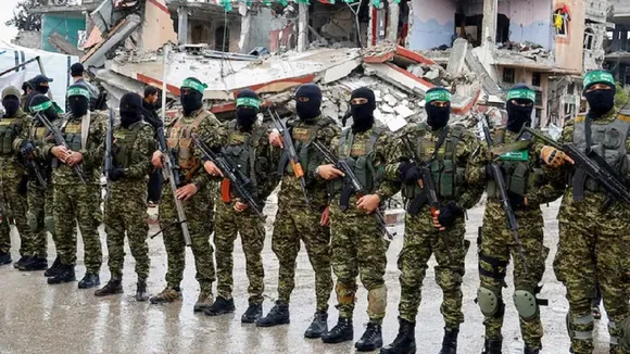 Hamas militants stand guard in Rafah in the southern Gaza Strip
