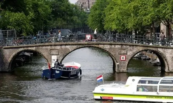 Amsterdam bans construction of new hotels and slashes river cruise stays amid over tourism effects