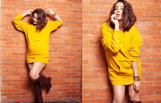 यैलो हुडि  पहन सुरवीन चावला ने करवाया फोटोशूट, क्यूट अंदाज के साथ बेबी बंप किया फ्लॉन्ट