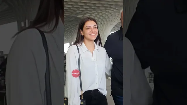Actress Kajal Aggarwal With Her Father Spotted at Mumbai Airport