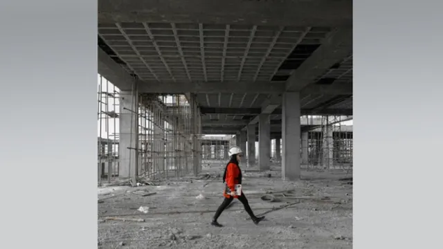woman at building construction site