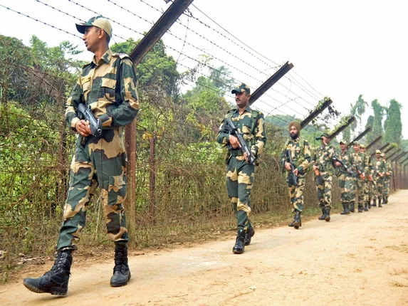 Border Security Force (BSF) personnel patrol along the India- Bangladesh border (Photo: Abhisek Saha/IANS)
