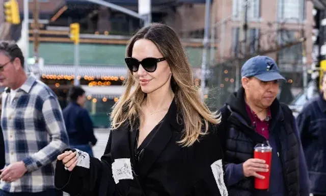 Angelina Jolie switches up her signature style with a patchwork coat
