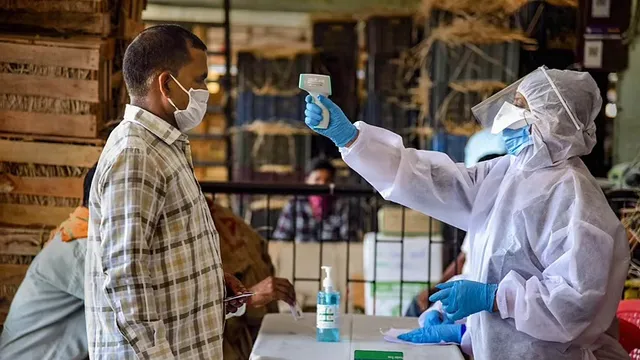 India logs a record 4.14 lakh new covid infections