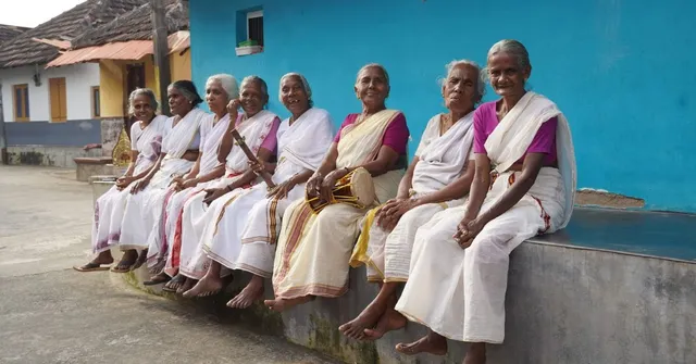 A group of elderly women singing the traditional 'Thuyilunarthu Paattu'