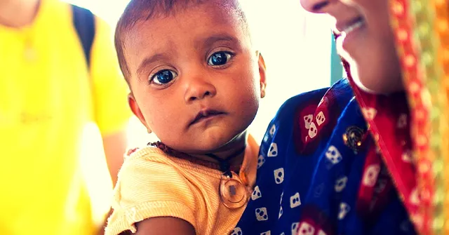 This Necklace Created by a Yale Grad & His Team Helps Kids in Rural India Get Vaccinated on Time