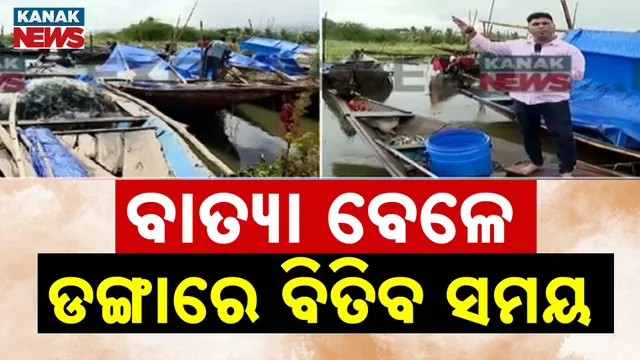 Fishermen take shelter in boats