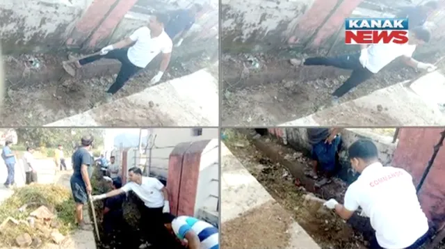 ପୁଲିସ ବାବୁଙ୍କ ଗାନ୍ଧିଗିରି ! ହାତରେ କୋଦାଳ ଓ ଝାଡୁ ଧରି ନାଳ ସଫା କଲେ ଡିଏସପି, ଆବର୍ଜନା ଫିଙ୍ଗୁଥିବା ଲୋକଙ୍କ ନାଁରେ ଜାରି କଲେ ନୋଟିସ