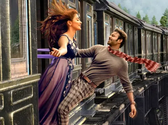 ଆସିଲା ପ୍ରଭାସଙ୍କ ବହୁ ପ୍ରତିକ୍ଷିତ ଫିଲ୍ମ ରାଧେଶ୍ୟାମର ଟିଜର । ରୋମାଣ୍ଟିକ ସିନ୍ ପାଇଁ ଷ୍ଟେସନ ସେଟରେ ଖର୍ଚ୍ଚ ହୋଇଛି ୧ କୋଟି ୬ ଲକ୍ଷ ଟଙ୍କା ।