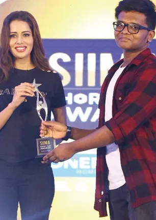 /idhalgal/cinikkuttu/young-record-holder