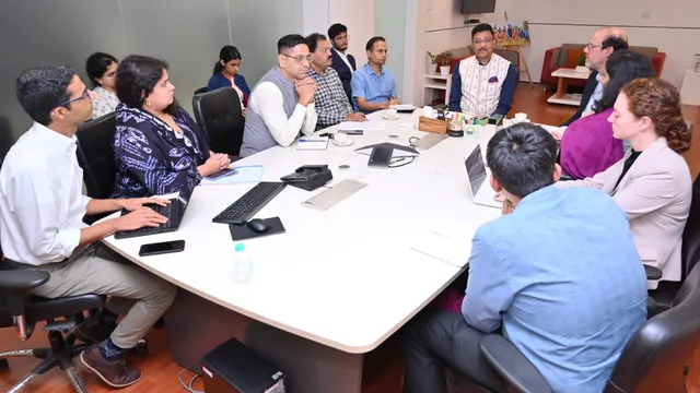 Nobel laureate with govt officials