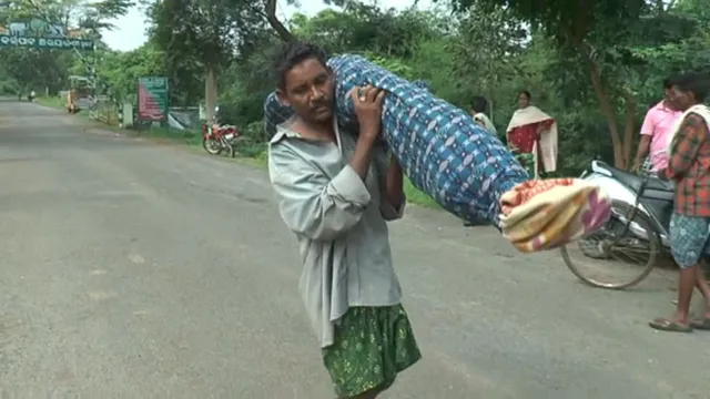 No money to hire a hearse; Odisha man carries wife’s body on shoulders