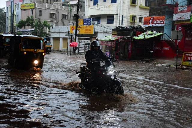 [In Pics] Heavy downpour throws life out of gear in Odisha capital