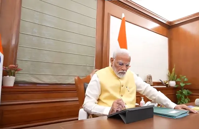 PM Modi signs first file for farmers' welfare