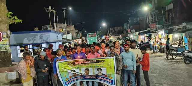 Kalinga residents pay tribute to three people who lost their lives in an accident by holding a candlelight procession