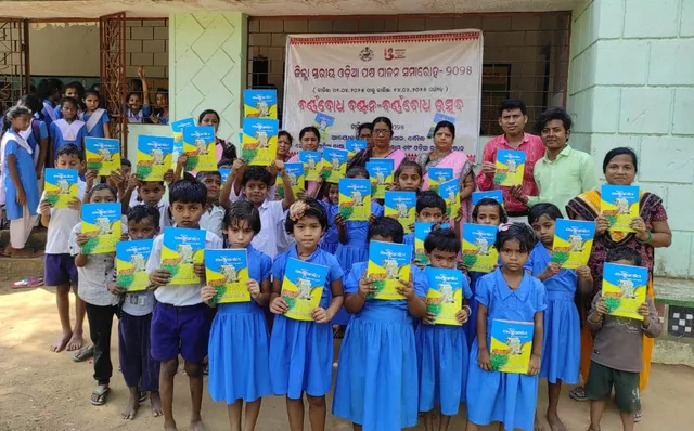 Distribution of Barnabodh at the district-level Barnabodh festival program