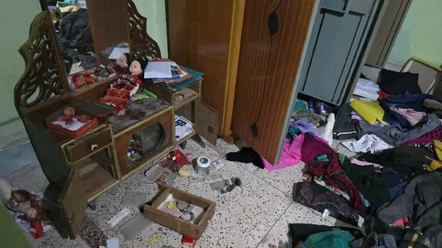 Gold ornamentslooted hand and foot tied