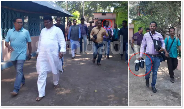 ମନ୍ତ୍ରୀଙ୍କ ଜୋତା ଧରି ପଛେ ପଛେ ଚାଲିଲେ କର୍ମଚାରୀ