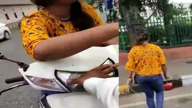 ଟ୍ରାଫିକ୍‌ ନିୟମ ଭାଙ୍ଗି ଯୁବତୀ ଦେଖାଇଲେ ଦାଦାଗିରି, ପୁଲିସକୁ କହିଲେ ‘ଚାଲାଣ କାଟିଲେ ଫାଶି ଦେଇ ଦେବି’