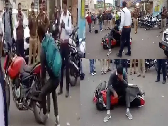 ପୁଲିସ ଜରିମାନା ଲଗାଇବାରୁ ବାଇକ୍‌କୁ ରୋଡରେ ଉଠାଇ କଚାଡିବା ପରେ ଭୋଭୋ ହୋଇ କାନ୍ଦିଲେ ଯୁବକ: ଭିଡିଓ ଭାଇରାଲ