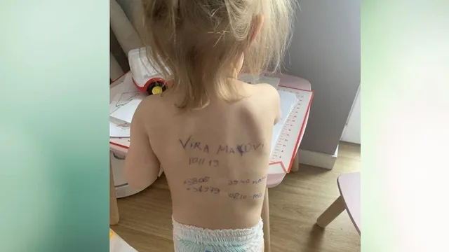 ଶିଶୁ ପିଠିରେ ଠିକଣା; ଏହା ‘ଗଜନି’ ଫିଲ୍ମ ନୁହେଁ, ରୁଷ-ୟୁକ୍ରେନ୍‌ ଯୁଦ୍ଧକାଳର ଏକ ଛାତିଥରା ଦୃଶ୍ୟ