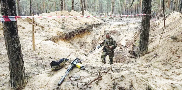 ରୁଷ୍‌ ବର୍ବରତାକୁ ବିଶ୍ବ ସାମ୍ନାକୁ ଆଣିବ ୟୁକ୍ରେନ୍‌: ୪୪୫ ଗଣ କବର ଠାବ