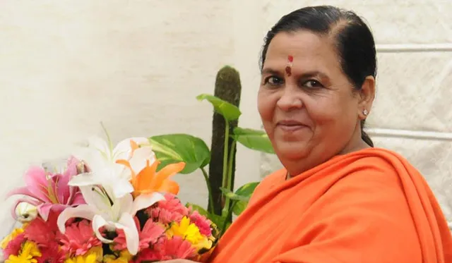 ମଦ ଦୋକାନ ଆଗରେ ବୁଲା ଗାଈ ବାନ୍ଧିଲେ ‘ବିଜେପି’ ନେତ୍ରୀ ଉମା ଭାରତୀ