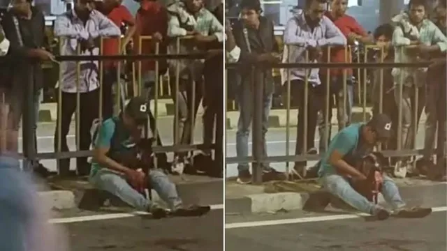 ଟ୍ରକ ଧକ୍କା ଦେବାରୁ ଗଲା ପୋଷା କୁକୁରର ଜୀବନ, ବିଚ୍ ରାସ୍ତାରେ ମୃତଦେହକୁ ଜାବୁଡ଼ି ଧରି କାନ୍ଦିଲେ ଯୁବକ