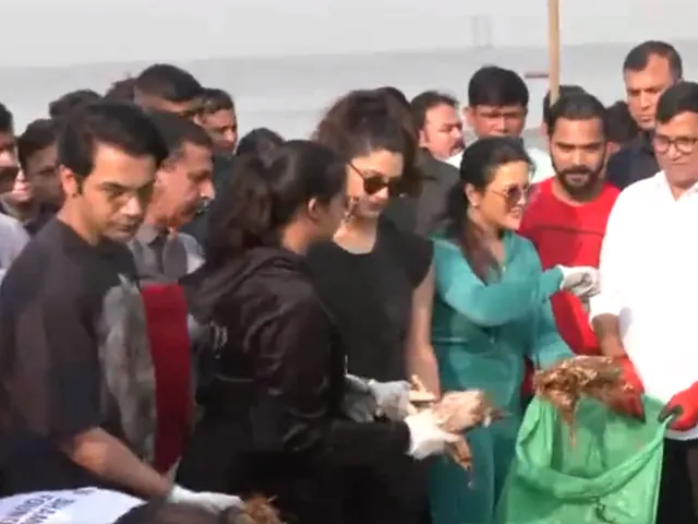 ম