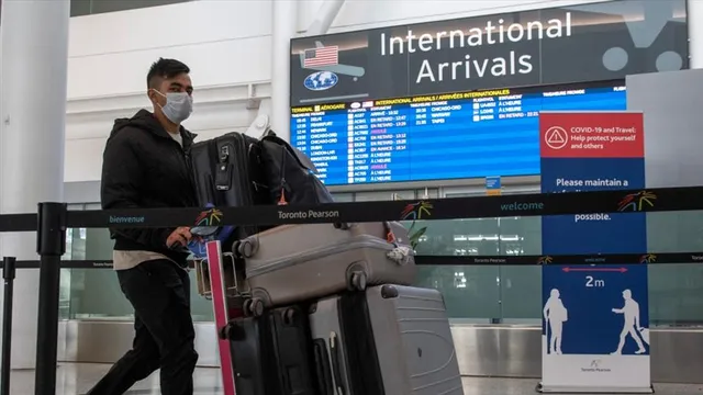 OTTAWA TO TOUGHEN INTERNATIONAL TRAVEL RESTRICTIONS AS OMICRON CONCERN ESCALATES